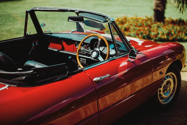 What's the Best Way to Enhance Steering Feel in a Classic Alfa Romeo Spider?