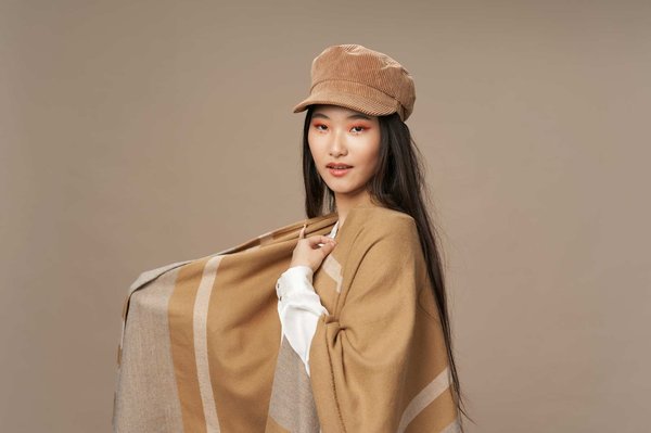 How Can You Create a Professional Outfit Centered Around a Chic Cape Blazer?